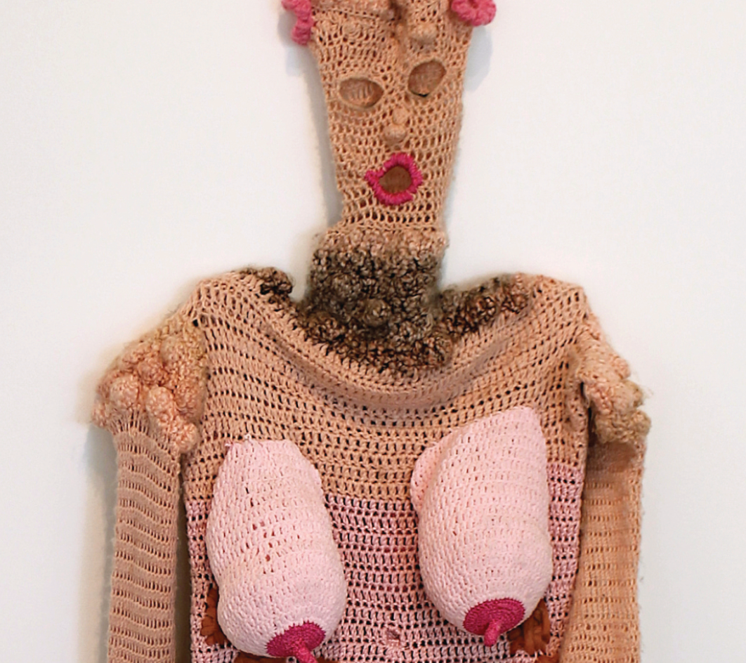 A crocheted, life-size naked woman suit