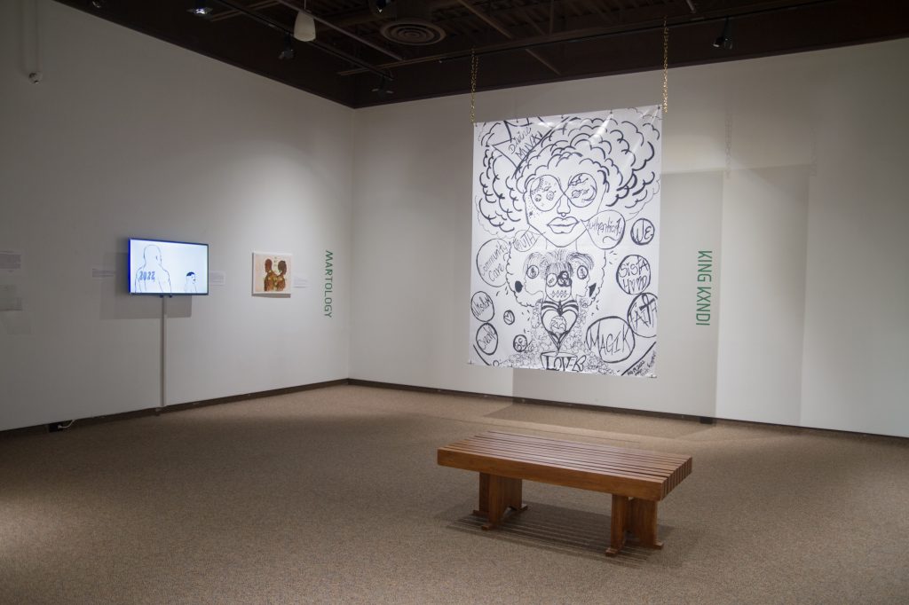 Installation view of Collective Intricacies, featuring work by Martology and Kxng Kendi